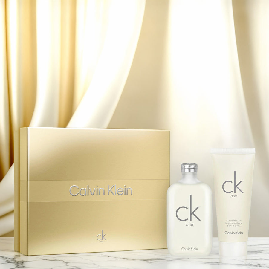 Calvin Klein CK One 2 Set: 6.7 Skin Moisturizer Lotion 6.7 oz Eau De Toilette Spray