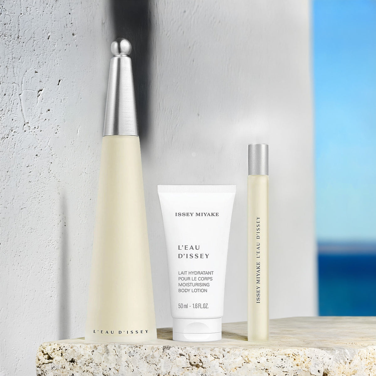 Issey Miyake 3 Piece Set: 3.3 oz Eau de Toilette + 0.33 oz Eau de Toilette + 1.6 oz Body Lotion For Women