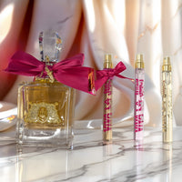 Juicy Couture Viva La Juicy 4 Piece Set: 3.4 oz Eau de Parfum + 0.33 oz Eau de Parfum + 0.33 oz Le Bubbly + 0.33 oz Gold Couture For Women