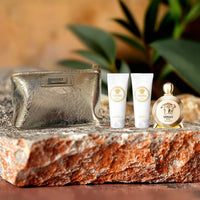 Versace Eros 4 Piece Set: 3.4 oz Eau de Parfum + 3.4 oz Body Lotion + 3.4 oz Bath & Shower Gel + Pouch For Women