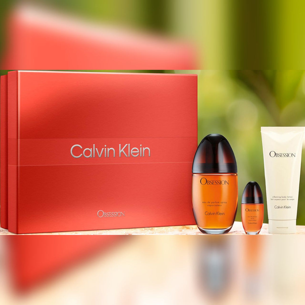 Calvin Klein Obsession 3 Pcs Set For Women: 3.4 Eau De Parfum Spray + 3.3 Body Lotion + 0.5 Eau De Parfum Spray