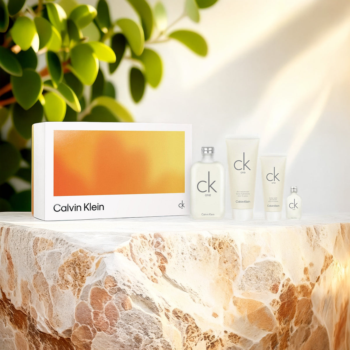 Calvin Klein Ck One 4 Pcs Set: 6.7 Eau De Toilette Spray + 6.7 Skin Moisturizer Lotion + 3.3 Body Wash + 15 ML Eau De Toilette Mini