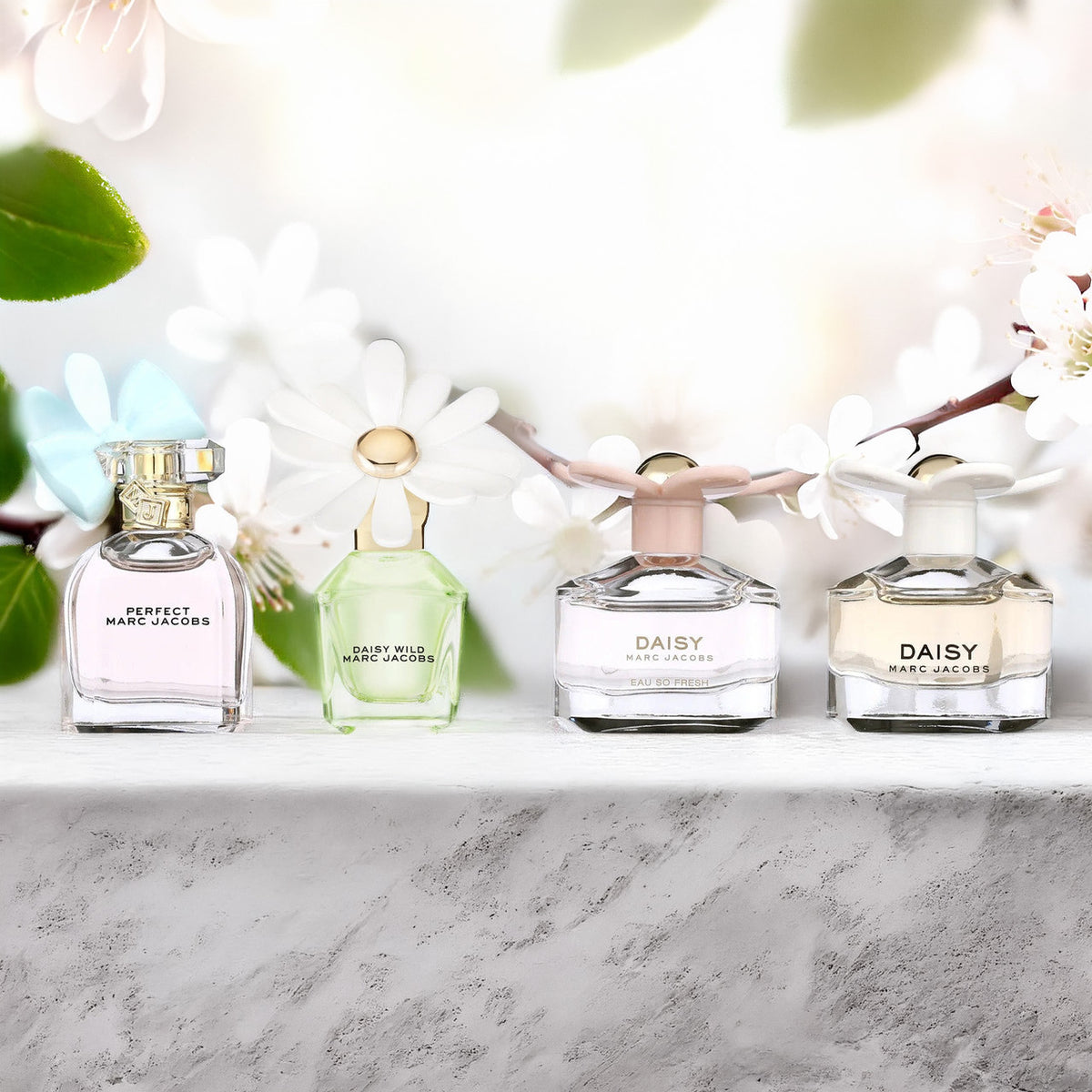 Marc Jacobs 4 Pcs Mini Set For Women: Daisy 4 ML Eau De Toilette + Daisy Eau So Fresh 4 ML Eau De Toilette + Daisy Wild 4 ML Eau De Parfum + Perfect 5 ML Eau De Parfum